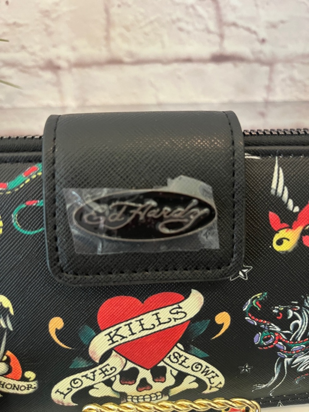 Ed Hardy Black Wristlet with Red, Yellow and Cream Tattoo Motifs - Picture 5 of 8